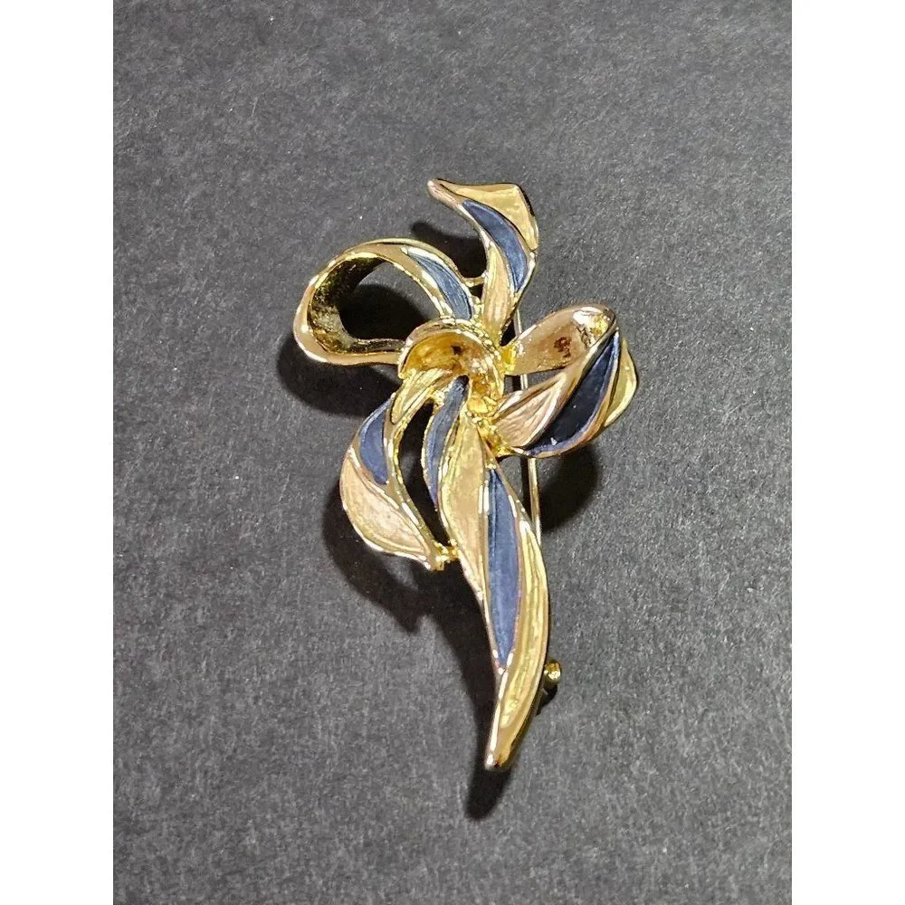 Vintage gold tone blue enamel bow brooch